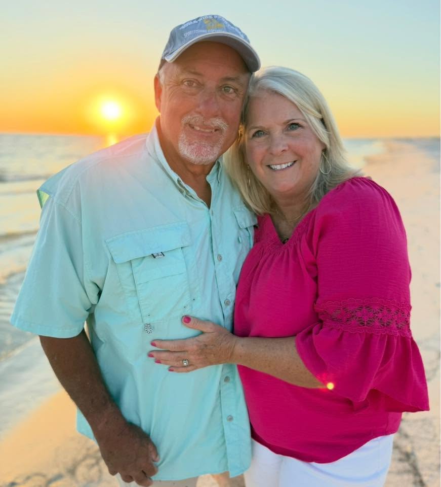 Rick Rickerson and his wife together at sunset