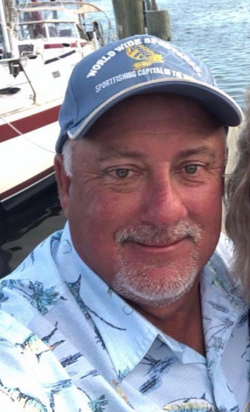 Portrait of Rent A Home Dumpster owner Rick Rickerson by the waterfront